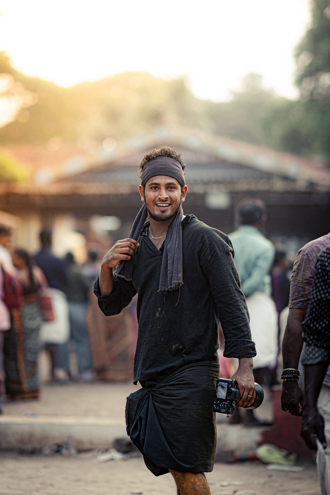 Sreejith KD photographing at a temple festival at first light